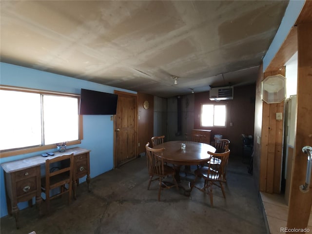 dining area with concrete flooring