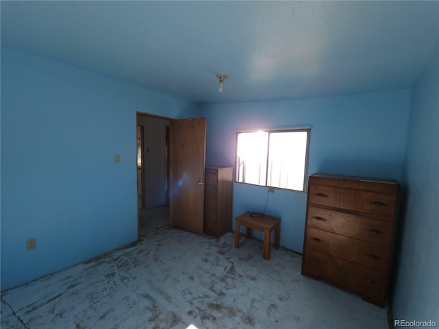 unfurnished bedroom with light carpet