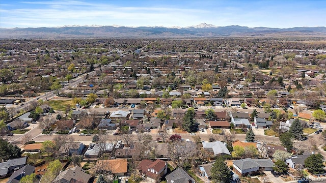 aerial view featuring a mountain view and a residential view