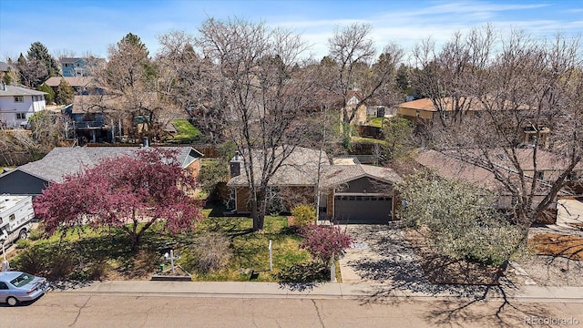 1746 Shavano St, Longmont, CO 80504 - obstructed view of property featuring a residential view, a garage, and driveway