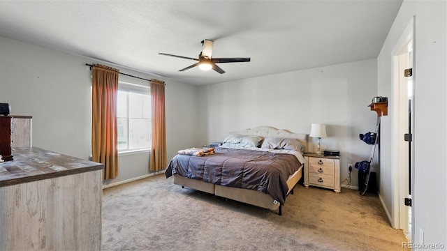 6207 Kildare Dr, Colorado Springs, CO 80927 - bedroom with light colored carpet, baseboards, and a ceiling fan