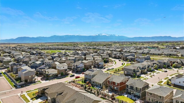 6207 Kildare Dr, Colorado Springs, CO 80927 - aerial view of residential area featuring a mountain backdrop