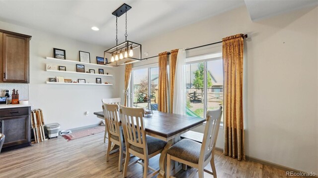 6207 Kildare Dr, Colorado Springs, CO 80927 - dining room with light wood-style flooring, baseboards, and recessed lighting
