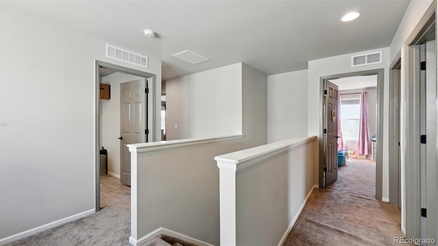 6207 Kildare Dr, Colorado Springs, CO 80927 - corridor with carpet, an upstairs landing, baseboards, and recessed lighting