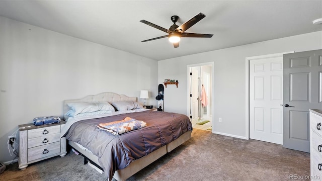 6207 Kildare Dr, Colorado Springs, CO 80927 - bedroom featuring dark colored carpet, ceiling fan, ensuite bathroom, and baseboards