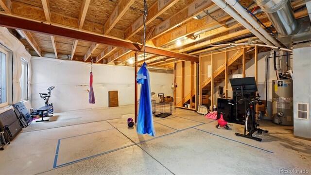 6207 Kildare Dr, Colorado Springs, CO 80927 - below grade area with water heater and stairs