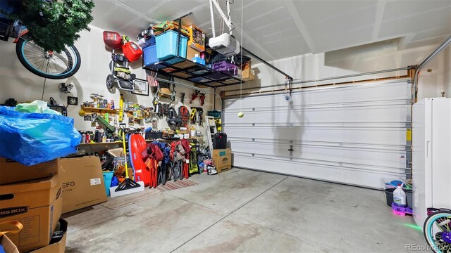 6207 Kildare Dr, Colorado Springs, CO 80927 - garage with a garage door opener