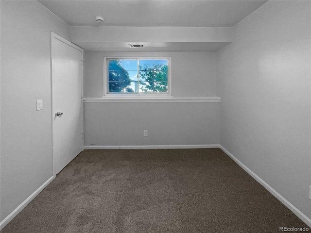 unfurnished room featuring carpet floors