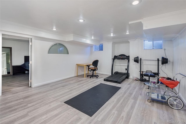 workout area featuring baseboards, recessed lighting, wood finished floors, and crown molding