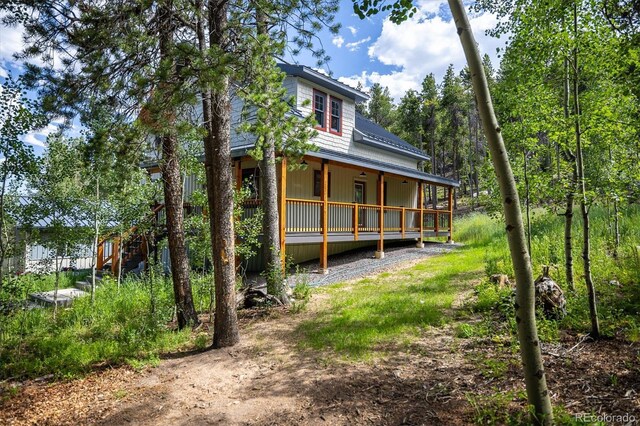 713 Rudi Ln, Golden, CO 80403 - back of property with covered porch and stairway