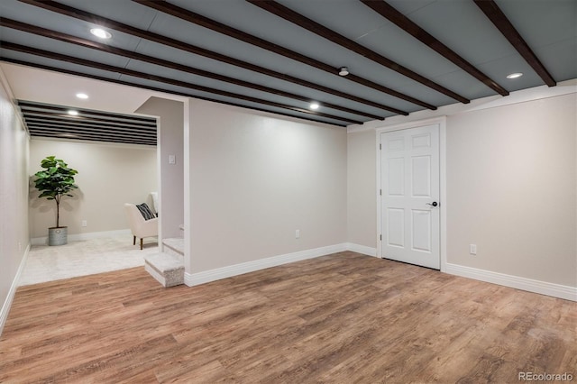 713 Rudi Ln, Golden, CO 80403 - finished basement featuring wood finished floors and recessed lighting