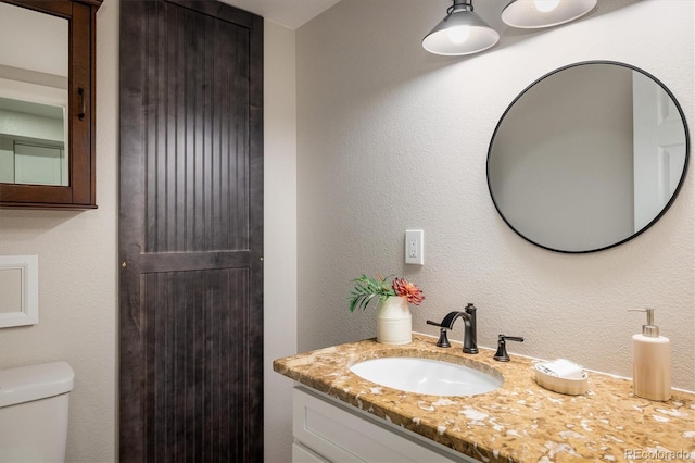 713 Rudi Ln, Golden, CO 80403 - bathroom with toilet and vanity
