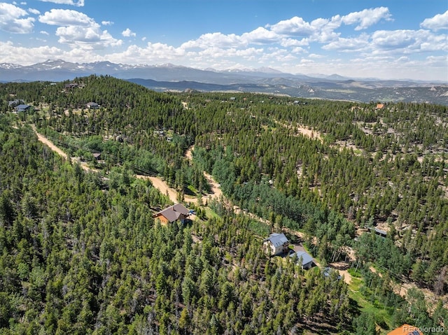713 Rudi Ln, Golden, CO 80403 - aerial view of property and surrounding area with a forest and a mountainous background