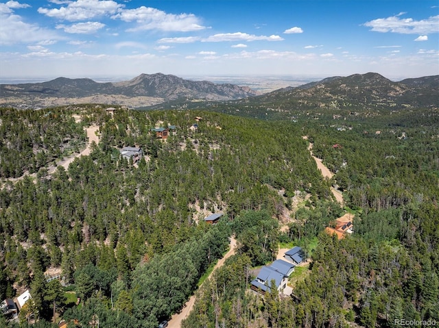 713 Rudi Ln, Golden, CO 80403 - aerial view of property's location featuring a mountainous background and a forest