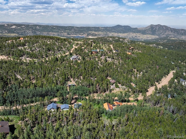 713 Rudi Ln, Golden, CO 80403 - aerial view of property's location featuring mountains and a heavily wooded area