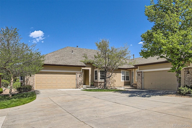6114 Salvia Ln, Arvada, CO 80403 - ranch-style house with brick siding, a garage, and driveway