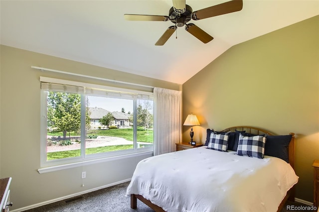 6114 Salvia Ln, Arvada, CO 80403 - carpeted bedroom with vaulted ceiling, baseboards, and a ceiling fan