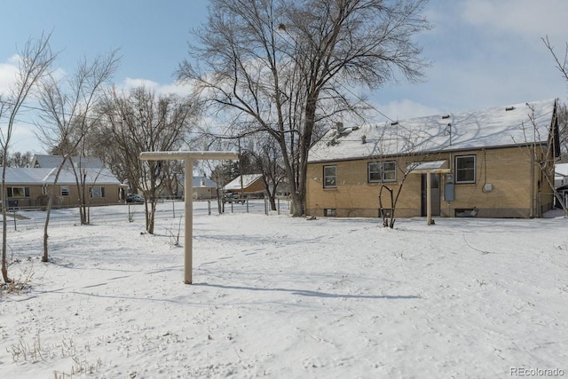 view of yard covered in snow