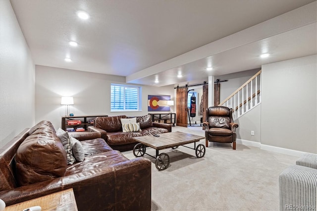 carpeted living area featuring stairway, recessed lighting, a barn door, and baseboards