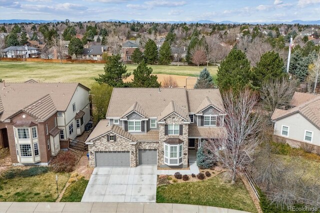 birds eye view of property with a residential view