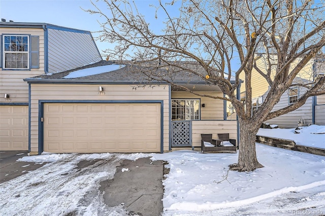 view of front of property featuring a garage