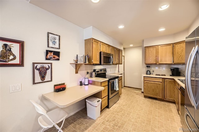 kitchen featuring backsplash and stainless steel appliances