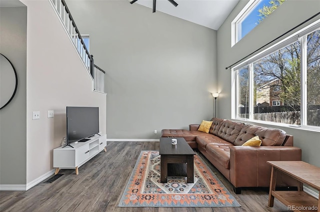 1899 Woodpark Dr, Colorado Springs, CO 80951 - living area featuring high vaulted ceiling, wood finished floors, ceiling fan, and baseboards
