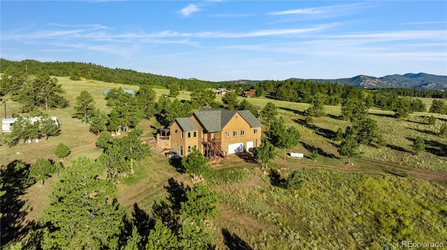 drone / aerial view with a rural view and a mountain view