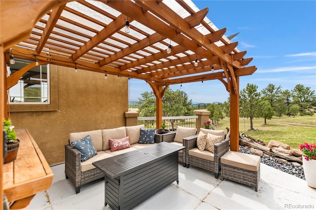 view of patio with a pergola and outdoor lounge area