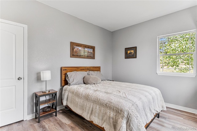 bedroom featuring light hardwood / wood-style floors