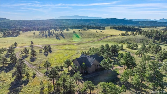 drone / aerial view with a rural view and a mountain view