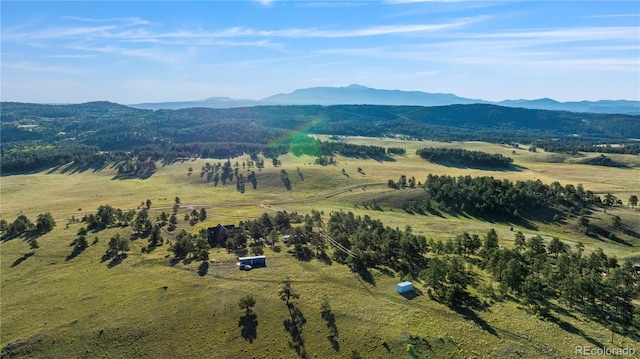 aerial view featuring a rural view and a mountain view