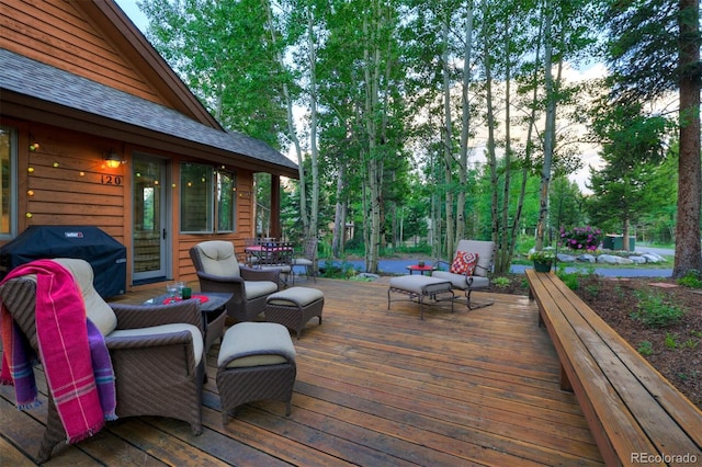 wooden deck with area for grilling