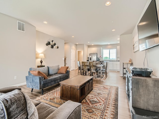 living room with light wood-type flooring