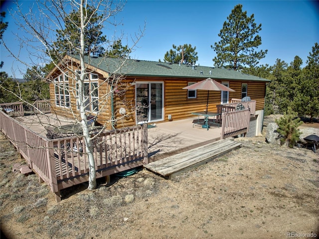 1258 Aspen Trl, Hartsel, CO 80449 - rear view of house featuring a deck and log siding