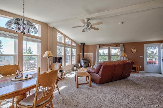 1258 Aspen Trl, Hartsel, CO 80449 - carpeted living room with a wood stove, a chandelier, healthy amount of natural light, and ceiling fan