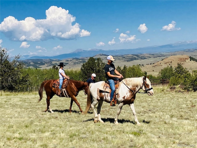 view of mountain feature with a rural view