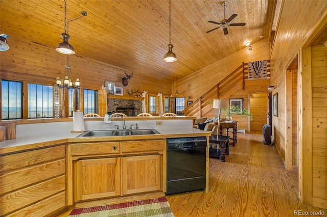 kitchen featuring light hardwood / wood-style floors, hanging light fixtures, black dishwasher, wooden ceiling, and wooden walls