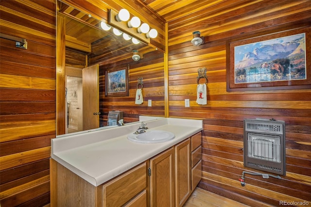 bathroom featuring hardwood / wood-style flooring, wood ceiling, vanity, and wood walls