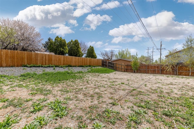 view of yard featuring a fenced backyard