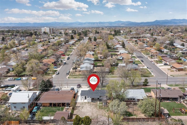 bird's eye view featuring a residential view and a mountain view