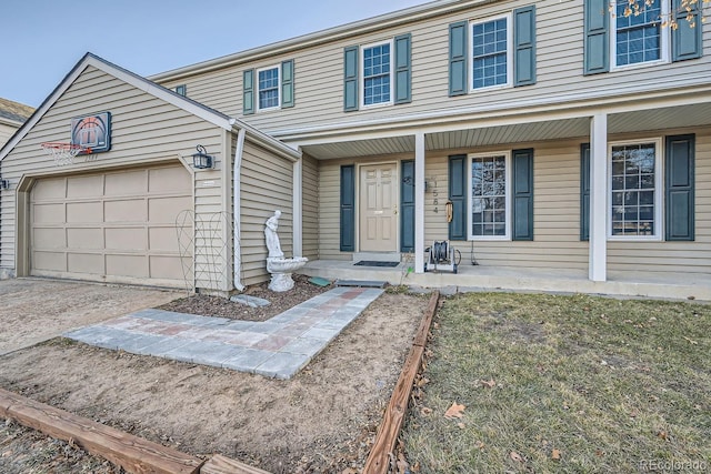 view of front of house with covered porch and a garage