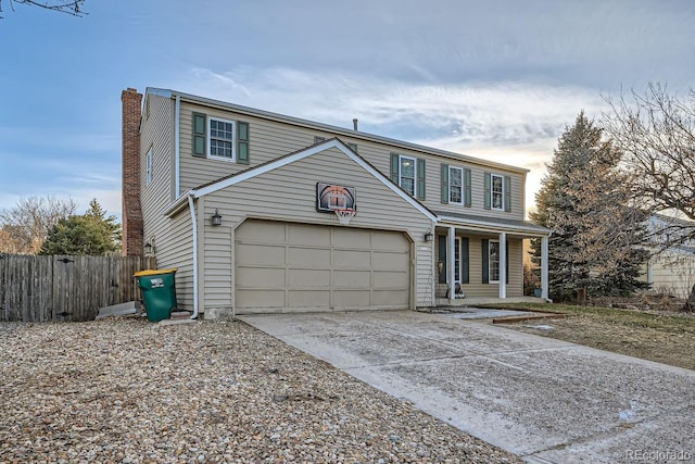 front facade with a garage and covered porch