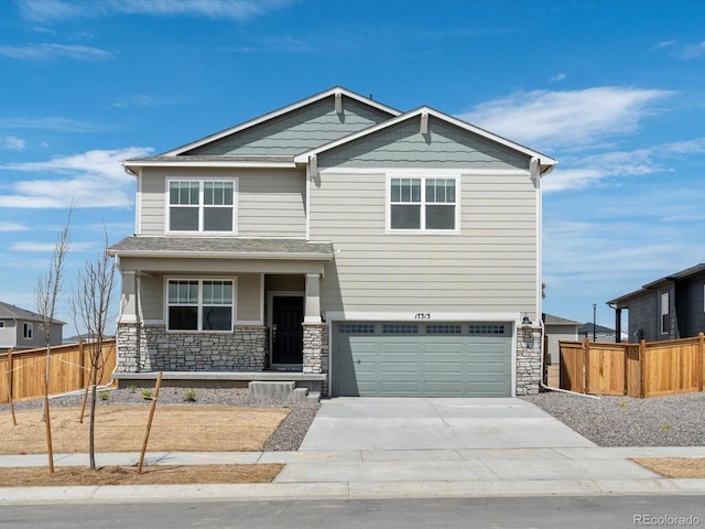 craftsman-style home with a garage