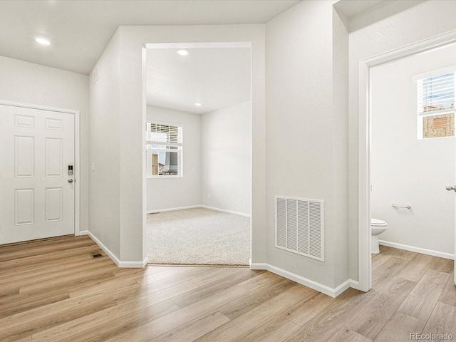 entryway with light hardwood / wood-style flooring