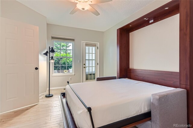 3040 W Prentice Ave Unit B, Littleton, CO 80123 - bedroom featuring light wood-style floors and a ceiling fan