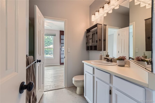 3040 W Prentice Ave Unit B, Littleton, CO 80123 - bathroom featuring vanity and toilet