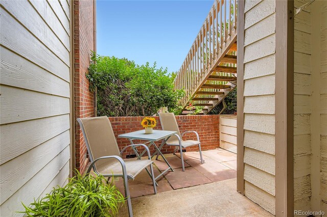 3040 W Prentice Ave Unit B, Littleton, CO 80123 - view of patio featuring stairway