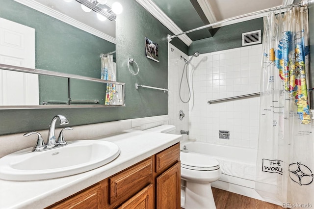 full bathroom with shower / bath combo, hardwood / wood-style floors, crown molding, vanity, and toilet