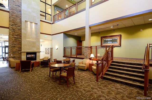 13500 E Cornell Ave Unit 302, Aurora, CO 80014 - community lobby featuring a high ceiling and stairway